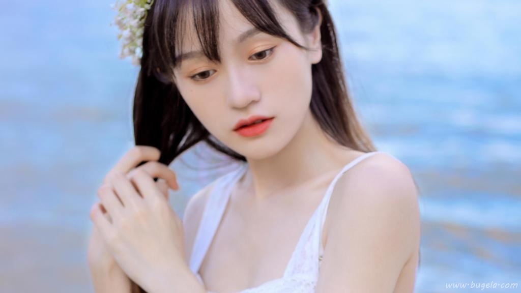 养眼小清新美女海边图片