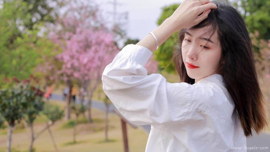 烂漫樱花下的美女图片