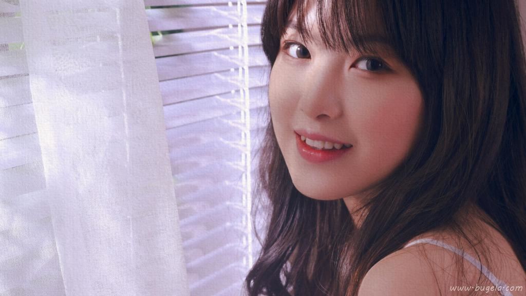 波浪卷长发美女柔情图片