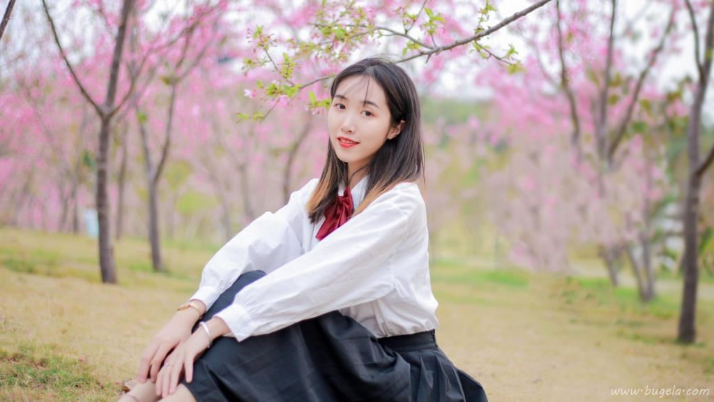 烂漫樱花下的美女图片