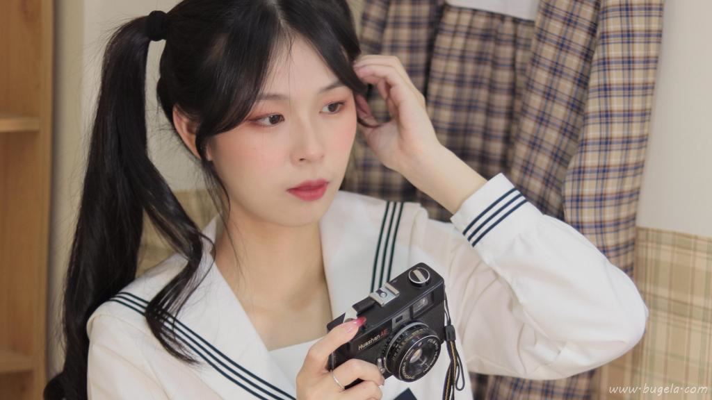 双马尾美女青春迷人图片