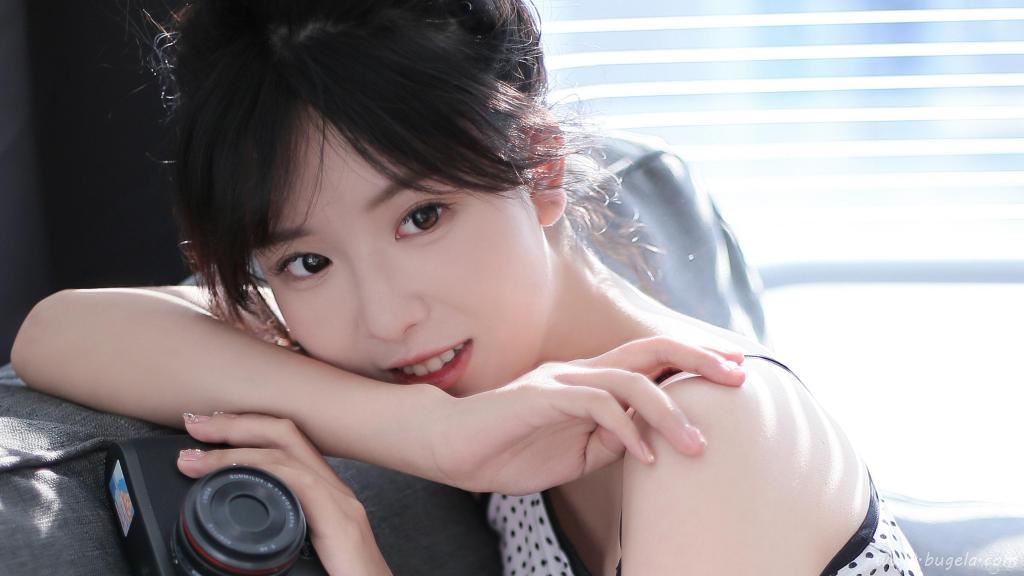 丸子头清新美女图片