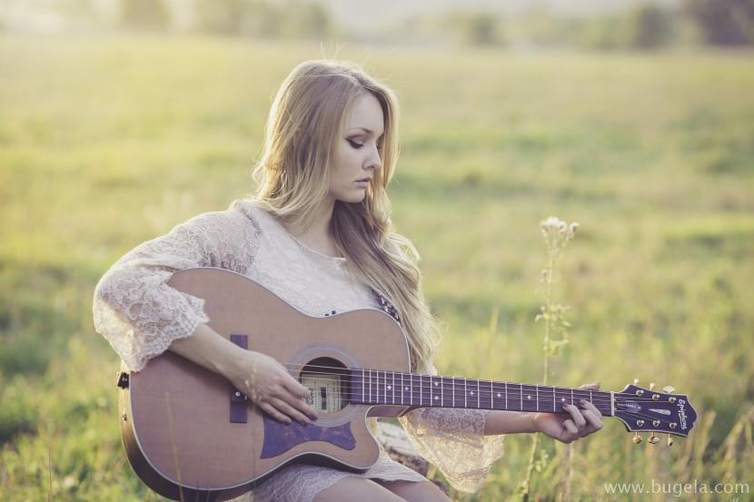 超美弹吉他的女子图片大全