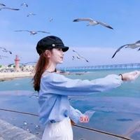 一个女人坐在海边的头像_头像女海边高清图片
