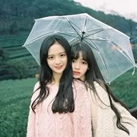 女孩雨中撑伞的唯美图片_雨伞女孩图片