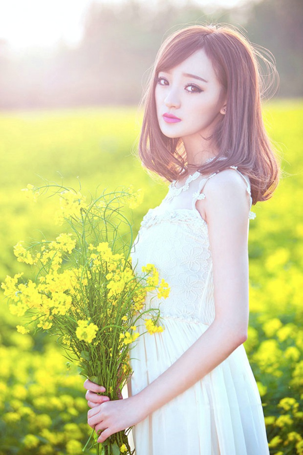 最美油菜花可爱女生甜美图片