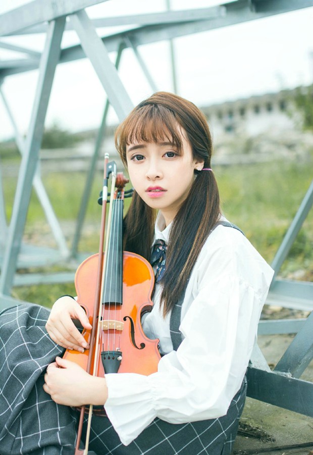 清纯马尾辫音乐系女学生图片 www.bugela.com 