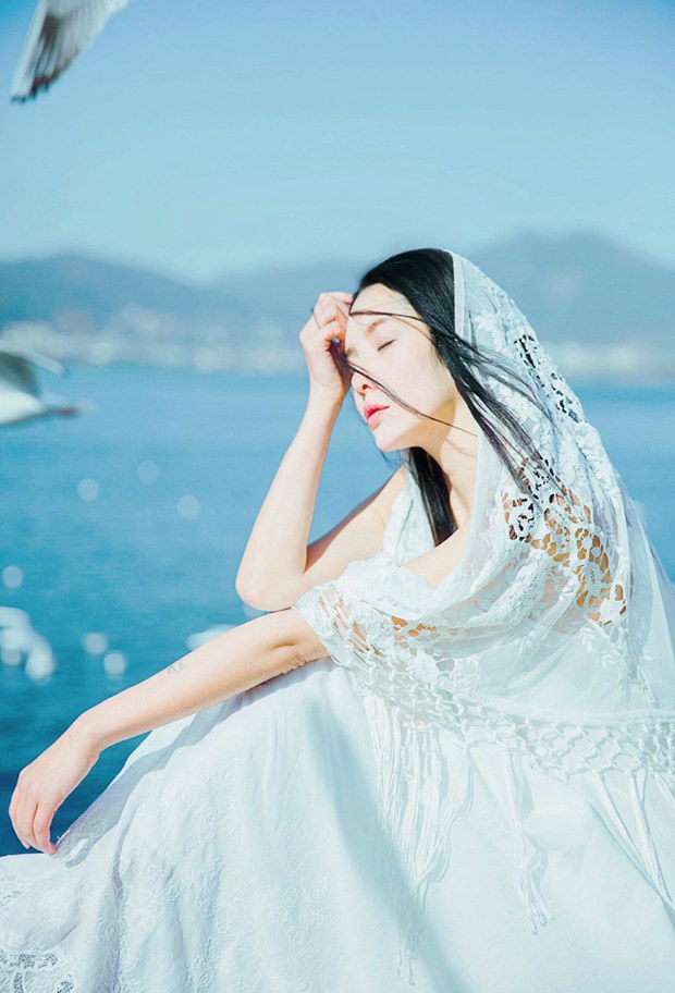 海边可爱唯美清新美女图片